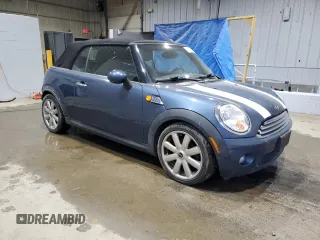 2009 MINI Convertible z VIN WMWMR335X9TJ93685, wystawiony jako Copart lot #50899755 z przebiegiem 123 609 mil mil oraz Szkoda całkowita • Salvage title. Historia ofert i sprzedaży dostępna na DreamBid. Obrazek 4.