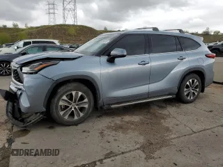 2021 Toyota Highlander XLE with VIN 5TDGZRAH7MS077254, listed as a Copart auction lot 55964005 with 76,883 mi miles and Salvage title. Bid and sale history available at DreamBid. Image 1.