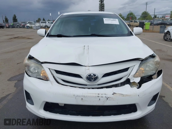 2011 Toyota Corolla L with VIN 2T1BU4EE6BC638383, listed as a IAAI auction lot 41934082 with 130,889 mi miles. Bid and sale history available at carsss.com. Image 12.