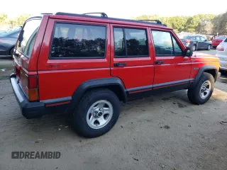 1996 Jeep Cherokee Sport with VIN 1J4FJ68S8TL285995, listed as a Copart auction lot 73333574 with 187,429 mi miles and Salvage Title. Bid and sale history available at carsss.com. Image 3.
