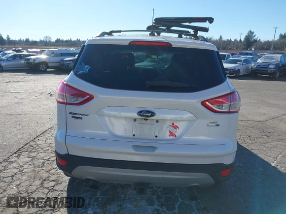 2016 Ford Escape SE with VIN 1FMCU9GX2GUB29249, listed as a IAAI auction lot 41545211 with 97,631 mi miles. Bid and sale history available at carsss.com. Image 17.