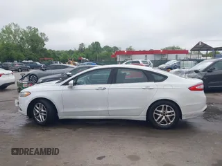 2013 Ford Fusion SE with VIN 3FA6P0H76DR106133, listed as a IAAI auction lot 42180076 with 199,398 mi miles and . Bid and sale history available at DreamBid. Image 14.