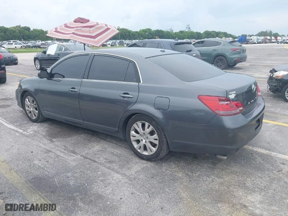 2009 Toyota Avalon XL with VIN 4T1BK36BX9U326676, listed as a IAAI auction lot 40436762 with 137,905 mi miles. Bid and sale history available at carsss.com. Image 3.
