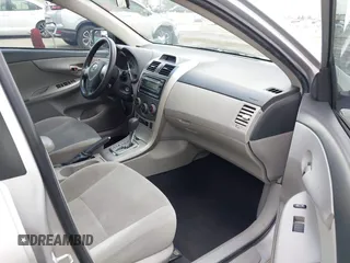 2012 Toyota Corolla L with VIN 2T1BU4EE9CC803165, listed as a IAAI auction lot 41924436 with 257,724 mi miles. Bid and sale history available at carsss.com. Image 5.
