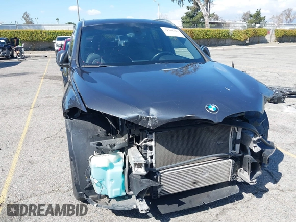 2018 BMW X1 sDrive28i with VIN WBXHU7C36J5L05628, listed as a IAAI auction lot 41708522 with 91,352 mi miles and . Bid and sale history available at DreamBid. Image 6.