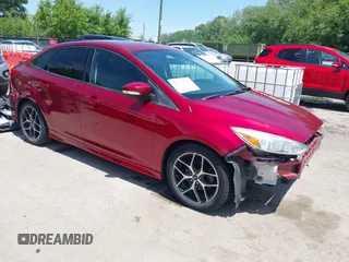 2015 Ford Focus SE with VIN 1FADP3F22FL275602, listed as a IAAI auction lot 42221421 with 112,864 mi miles and . Bid and sale history available at DreamBid. Image 1.