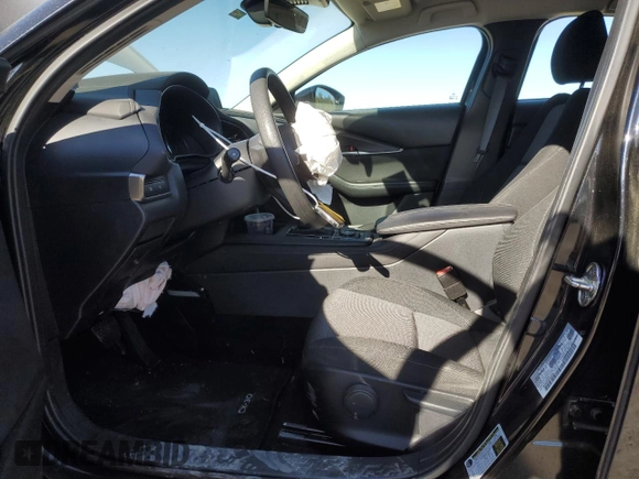 2024 Mazda CX-30 S with VIN 3MVDMBAM5RM688864, listed as a Copart auction lot 49920665 with 25,838 mi miles and Salvage Title. Bid and sale history available at DreamBid. Image 7.