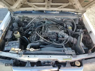 2000 Nissan Frontier XE z VIN 1N6ED27T3YC422129, wystawiony jako Copart lot #46668975 z przebiegiem 333 836 mil mil oraz Szkoda całkowita • Salvage title. Historia ofert i sprzedaży dostępna na DreamBid. Obrazek 12.