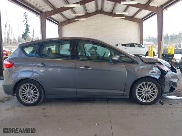 2013 Ford C-Max Hybrid SE with VIN 1FADP5AU4DL556432, listed as a IAAI auction lot 41703080 with 147,693 mi miles. Bid and sale history available at carsss.com. Image 13.