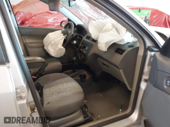 2005 Ford Focus S with VIN 1FAFP34N85W224267, listed as a IAAI auction lot 42349913 with 140,413 mi miles and . Bid and sale history available at DreamBid. Image 5.