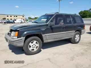 1995 Jeep Grand Cherokee Laredo z VIN 1J4FX58S9SC534442, wystawiony jako Copart lot #61233725 z przebiegiem 363 688 mil mil oraz Szkoda całkowita • Salvage title. Historia ofert i sprzedaży dostępna na DreamBid. Obrazek 1.