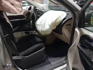 2014 Dodge Grand Caravan SXT with VIN 2C4RDGCGXER263963, listed as a IAAI auction lot 41956264 with 138,815 mi miles. Bid and sale history available at carsss.com. Image 5.