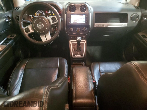 2017 Jeep Compass Latitude with VIN 1C4NJDEB6HD168072, listed as a Copart auction lot 63045025 with 82,975 mi miles and Salvage title. Bid and sale history available at DreamBid. Image 8.