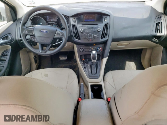 2015 Ford Focus SE z VIN 1FADP3F22FL343834, wystawiony jako Copart lot #58076265 z przebiegiem 101 891 mil mil oraz Szkoda całkowita • Salvage title. Historia ofert i sprzedaży dostępna na DreamBid. Obrazek 8.