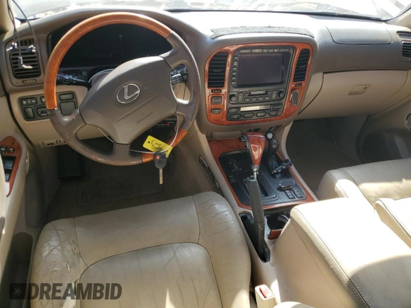 2002 Lexus LX 470 z VIN JTJHT00W723514716, wystawiony jako Copart lot #42646295 z przebiegiem 188 817 mil mil oraz Szkoda całkowita • Salvage title. Historia ofert i sprzedaży dostępna na DreamBid. Obrazek 8.