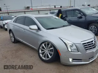 2014 Cadillac XTS Luxury with VIN 2G61M5S3XE9178236, listed as a IAAI auction lot 41786581 with 39,844 mi miles. Bid and sale history available at carsss.com. Image 1.