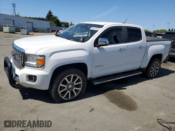 2017 GMC Canyon 4WD Denali z VIN 1GTG6EEN5H1308429, wystawiony jako Copart lot #56491935 z przebiegiem 92 122 mil mil oraz Szkoda całkowita • Salvage title. Historia ofert i sprzedaży dostępna na DreamBid. Obrazek 1.