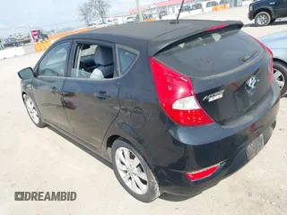 2012 Hyundai Accent SE with VIN KMHCU5AE8CU015055, listed as a IAAI auction lot 41814610 with 141,769 mi miles. Bid and sale history available at carsss.com. Image 3.