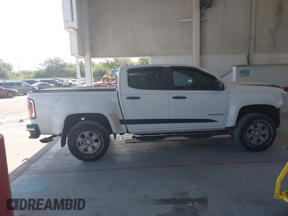 2015 GMC Canyon 2WD z VIN 1GTG5AEA8F1256722, wystawiony jako IAAI lot #42159367 z przebiegiem 140 963 mil mil oraz . Historia ofert i sprzedaży dostępna na DreamBid. Obrazek 14.