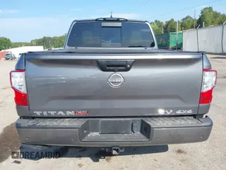 2023 Nissan Titan SV with VIN 1N6AA1EC6PN101712, listed as a IAAI auction lot 40206621 with 50,210 mi miles and . Bid and sale history available at DreamBid. Image 16.