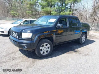 2007 Honda Ridgeline RTL w/Leather with VIN 2HJYK165X7H548322, listed as a IAAI auction lot 41983105 with 152,292 mi miles. Bid and sale history available at carsss.com. Image 2.