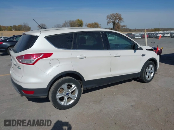 2014 Ford Escape SE with VIN 1FMCU0G99EUA71540, listed as a IAAI auction lot 40651416 with 230,849 mi miles. Bid and sale history available at carsss.com. Image 4.
