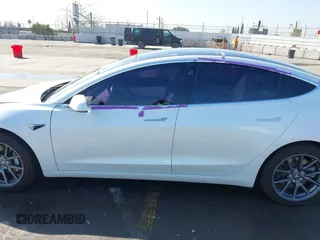 2020 Tesla Model 3 Standard Range Plus with VIN 5YJ3E1EA4LF805205, listed as a IAAI auction lot 41850744 with Not Provided miles. Bid and sale history available at carsss.com. Image 13.