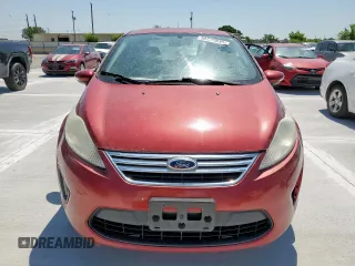 2013 Ford Fiesta SE z VIN 3FADP4BJXDM193759, wystawiony jako Copart lot #58230835 z przebiegiem 174 158 mil mil oraz Czysty tytuł • Clean title. Historia ofert i sprzedaży dostępna na DreamBid. Obrazek 5.
