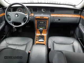2006 Kia Amanti z VIN KNALD124265088470, wystawiony jako Copart lot #54974125 z przebiegiem 112 913 mil mil oraz Tytuł czysty. Historia ofert i sprzedaży dostępna na DreamBid. Obrazek 8.