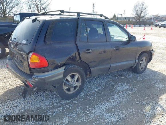 2004 Hyundai Santa Fe GLS with VIN KM8SC13E64U742880, listed as a IAAI auction lot 41764097 with 126,559 mi miles. Bid and sale history available at carsss.com. Image 4.