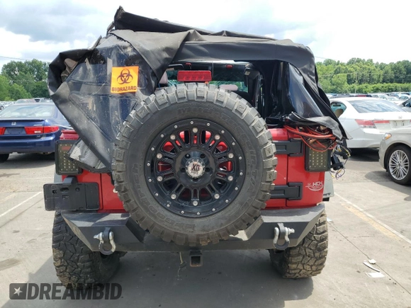 2014 Jeep Wrangler Sport with VIN 1C4AJWAG4EL205584, listed as a Copart auction lot 63671245 with Not provided miles and Salvage title. Bid and sale history available at DreamBid. Image 6.