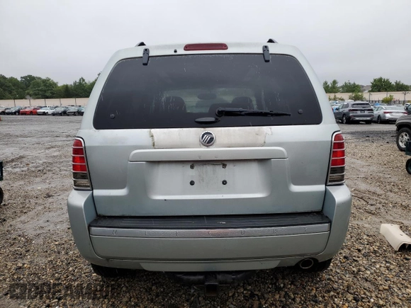 2005 Mercury Mariner Luxury z VIN 4M2CU56185DJ12005, wystawiony jako Copart lot #73570914 z przebiegiem 185 354 mil mil oraz Tytuł czysty. Historia ofert i sprzedaży dostępna na DreamBid. Obrazek 6.