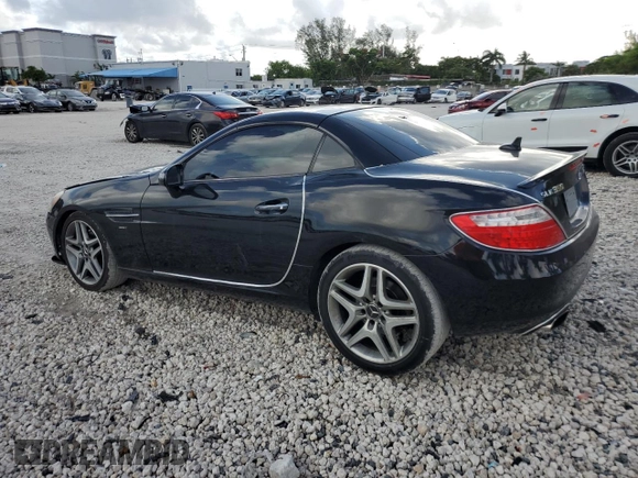 2015 Mercedes-Benz SLK-Class SLK 250 with VIN WDDPK4HA9FF112773, listed as a Copart auction lot 63842954 with 88,556 mi miles and Salvage Title. Bid and sale history available at carsss.com. Image 2.