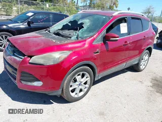 2014 Ford Escape Titanium with VIN 1FMCU0JXXEUD22430, listed as a IAAI auction lot 41775085 with 1 mi miles. Bid and sale history available at carsss.com. Image 2.