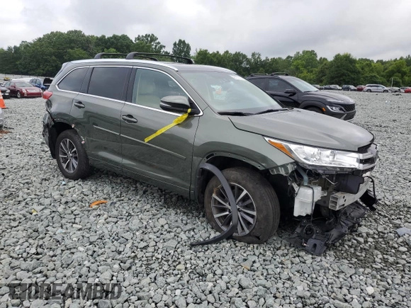 2018 Toyota Highlander SE with VIN 5TDJZRFH8JS888491, listed as a Copart auction lot 61197555 with Not provided miles and Salvage title. Bid and sale history available at DreamBid. Image 4.