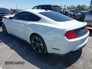 2021 Ford Mustang EcoBoost with VIN 1FA6P8TH4M5148415, listed as a IAAI auction lot 41945395 with 51,599 mi miles and . Bid and sale history available at DreamBid. Image 3.