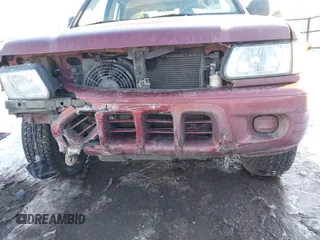 2002 Isuzu Rodeo z VIN 4S2DM58W124319936, wystawiony jako IAAI lot #41555285 z przebiegiem 143 035 mil mil oraz . Historia ofert i sprzedaży dostępna na DreamBid. Obrazek 6.