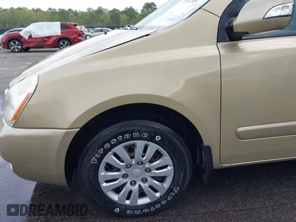2011 Kia Sedona LX with VIN KNDMG4C71B6407306, listed as a IAAI auction lot 41922697 with 243,248 mi miles. Bid and sale history available at carsss.com. Image 6.