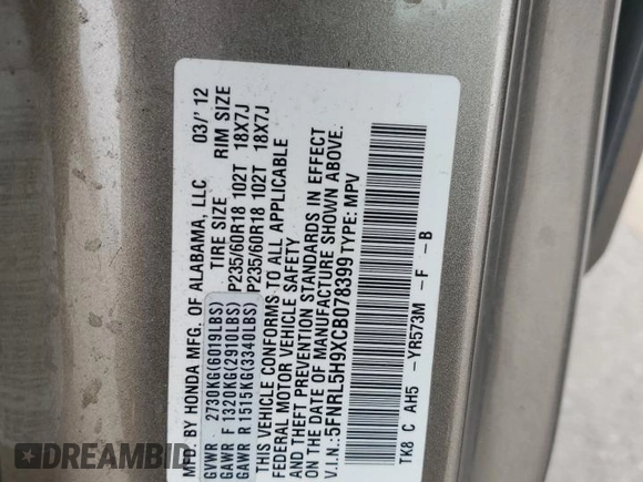 2012 Honda Odyssey Touring with VIN 5FNRL5H9XCB078399, listed as a Copart auction lot 52360165 with 174,819 mi miles and Salvage Title. Bid and sale history available at DreamBid. Image 15.