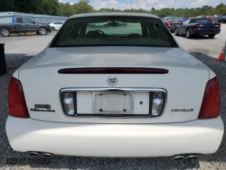2003 Cadillac DeVille with VIN 1G6KD54Y73U139441, listed as a Copart auction lot 68880014 with 131,345 mi miles and Salvage Title. Bid and sale history available at carsss.com. Image 6.