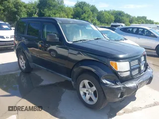 2010 Dodge Nitro SXT z VIN 1D4PT5GK2AW104047, wystawiony jako IAAI lot #42454184 z przebiegiem 132 041 mil mil oraz . Historia ofert i sprzedaży dostępna na DreamBid. Obrazek 1.