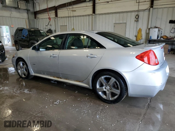 2009 Pontiac G6 with VIN 1G2ZL577894230250, listed as a Copart auction lot 63275235 with 166,792 mi miles and Clean title. Bid and sale history available at DreamBid. Image 2.