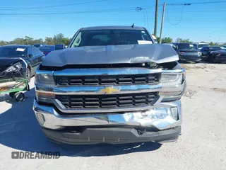2016 Chevrolet Silverado 1500 LT with VIN 3GCUKREC8GG219524, listed as a IAAI auction lot 41087657 with 123,010 mi miles and . Bid and sale history available at DreamBid. Image 12.