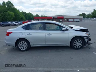 2019 Nissan Sentra S z VIN 3N1AB7AP6KY205658, wystawiony jako IAAI lot #42151392 z przebiegiem 80 395 mil mil oraz . Historia ofert i sprzedaży dostępna na DreamBid. Obrazek 13.