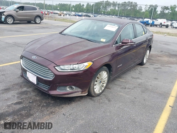 2013 Ford Fusion SE Hybrid with VIN 3FA6P0LU2DR178539, listed as a IAAI auction lot 42120614 with 177,500 mi miles. Bid and sale history available at carsss.com. Image 2.