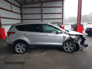 2019 Ford Escape Titanium with VIN 1FMCU9J9XKUA37695, listed as a IAAI auction lot 41868388 with 50,095 mi miles. Bid and sale history available at carsss.com. Image 13.