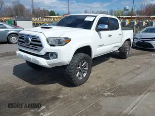 2018 Toyota Tacoma SR with VIN 3TMGZ5AN1JM150189, listed as a IAAI auction lot 41814119 with 109,014 mi miles. Bid and sale history available at carsss.com. Image 2.