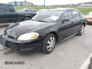 2013 Chevrolet Impala Police with VIN 2G1WD5E35D1234202, listed as a IAAI auction lot 41947209 with 98,718 mi miles. Bid and sale history available at carsss.com. Image 2.