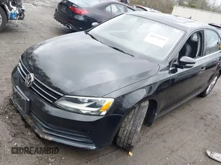 2015 Volkswagen Jetta Sedan 1.8T SE with VIN 3VWD17AJ3FM225093, listed as a IAAI auction lot 41974219 with 69,061 mi miles. Bid and sale history available at carsss.com. Image 2.