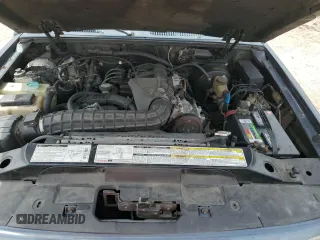 1999 Ford Explorer Sport z VIN 1FMYU22X9XUC03819, wystawiony jako Copart lot #69840564 z przebiegiem 214 315 mil mil oraz Szkoda całkowita • Salvage title. Historia ofert i sprzedaży dostępna na DreamBid. Obrazek 12.